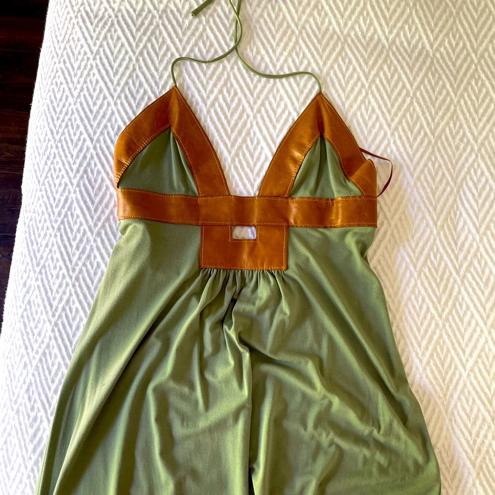 Boutique dress with real leather upper.
